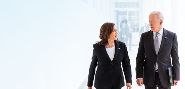 President Biden and Vice President Harris walking and talking