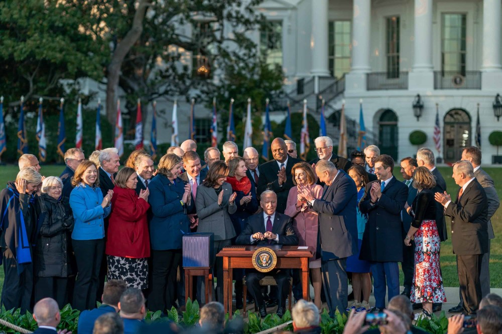 President Joe Biden signing the Infrastructure Investment and Jobs Act, Monday, November 15, 2021, on the South Lawn of the White House.