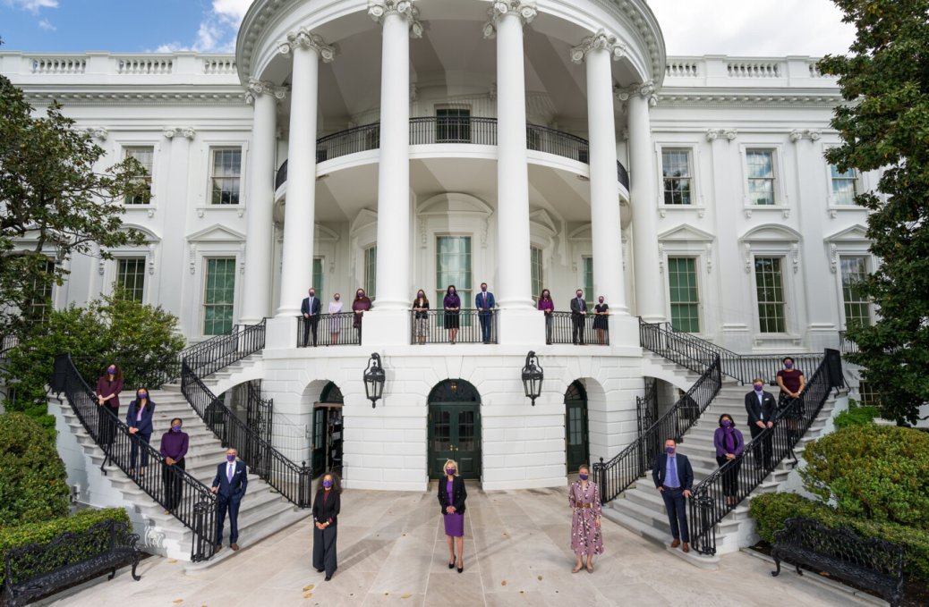 First Lady Jill Biden poses for a “Purple Up” photo with staff